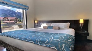 1 bedroom, desk, iron/ironing board, travel crib
