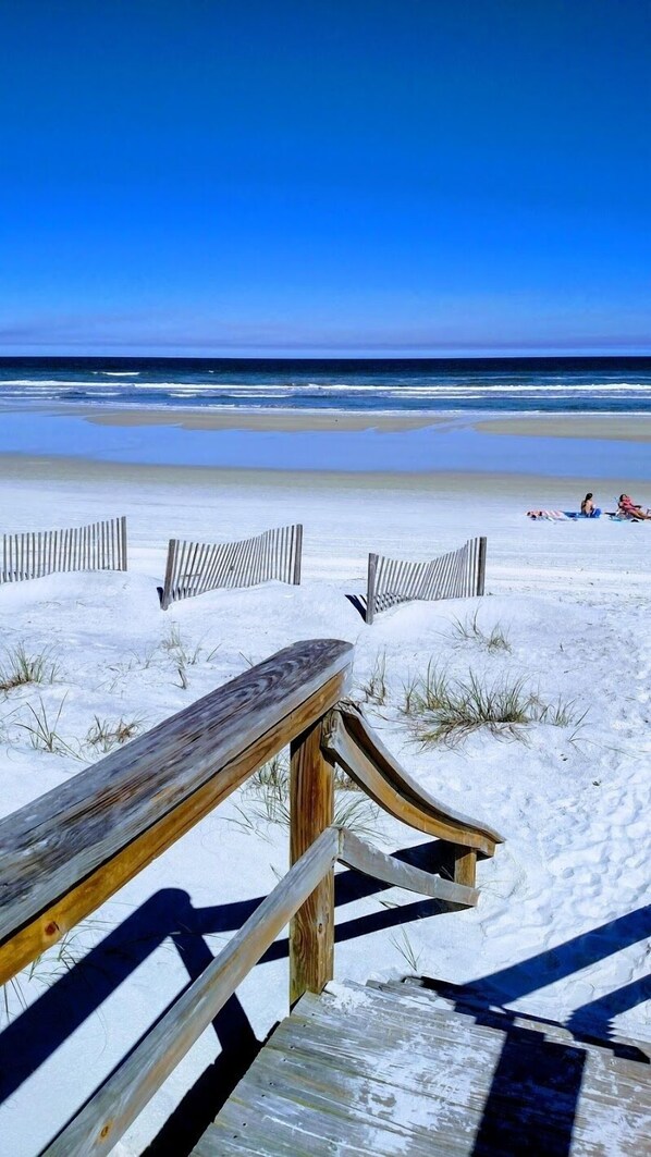 On the beach, sun-loungers, beach towels