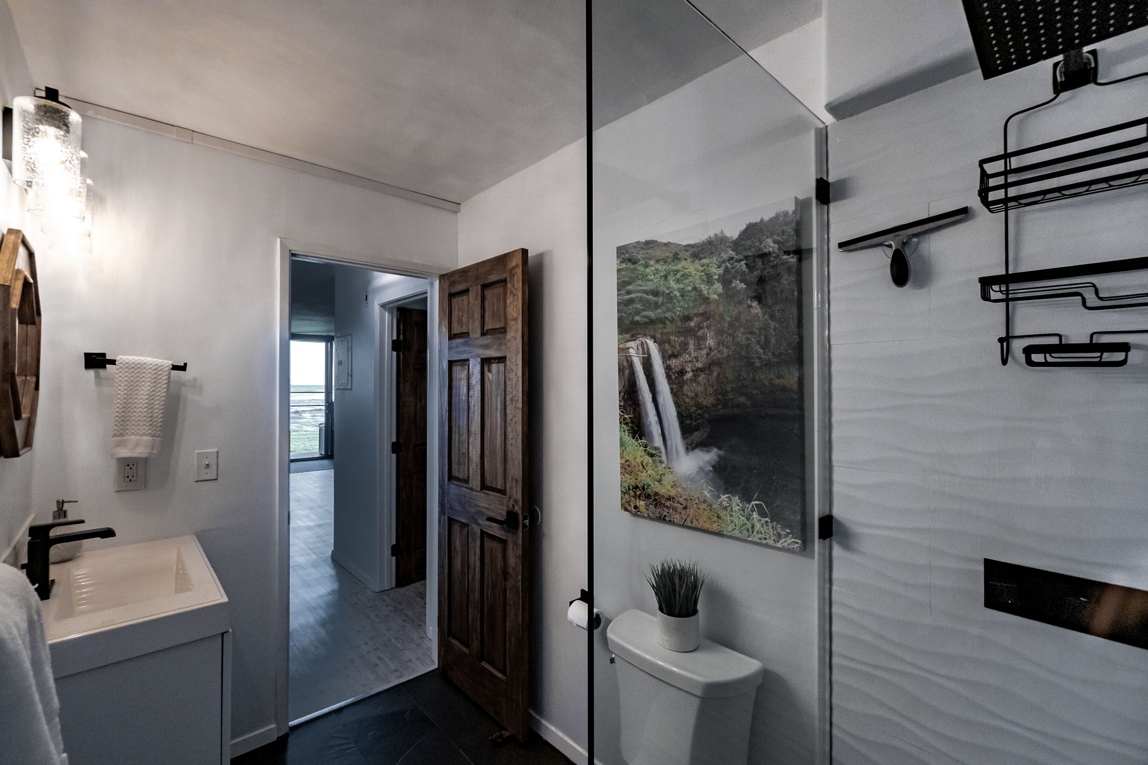 Shower, hair dryer, towels, toilet paper