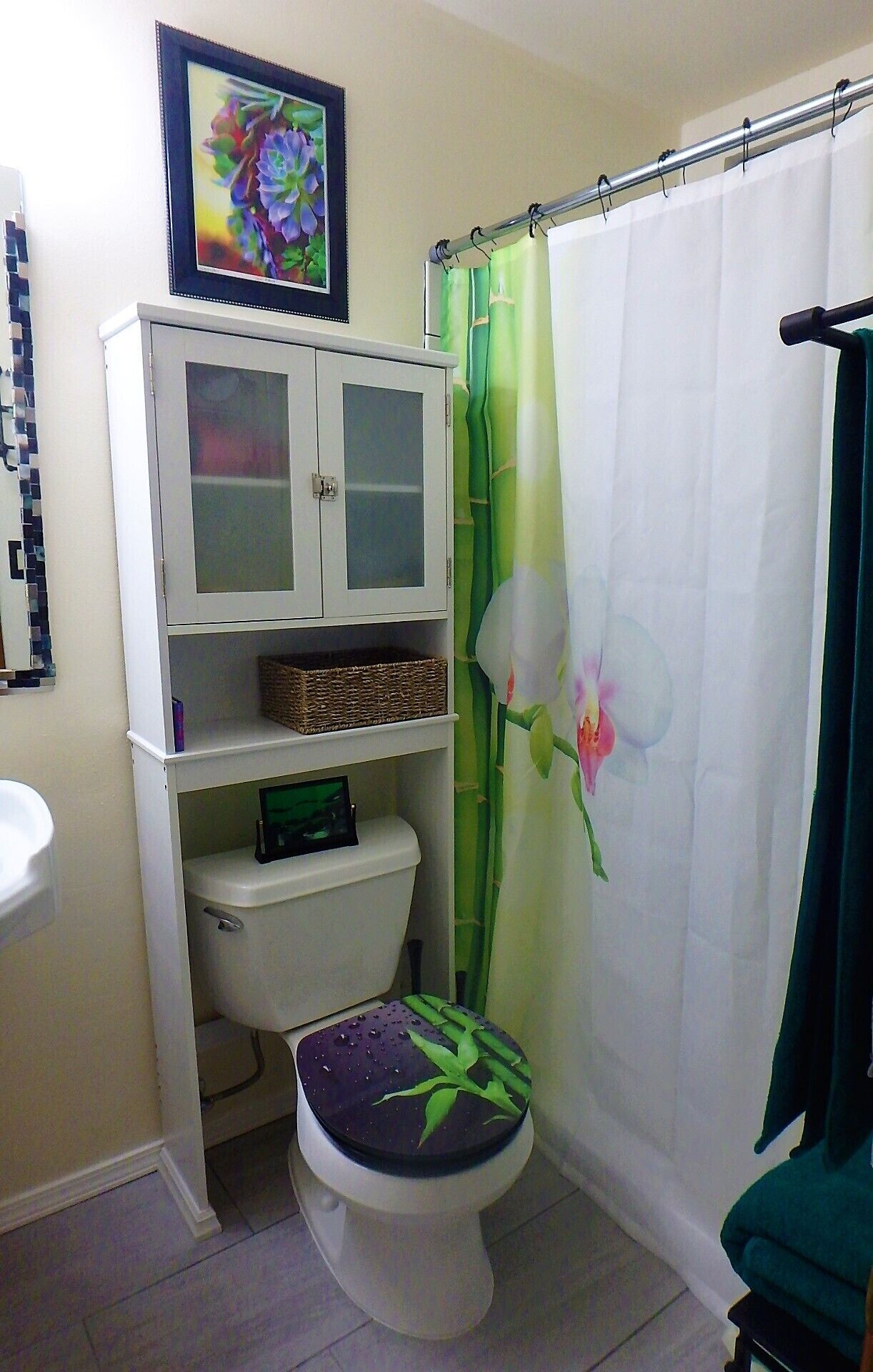 Combined shower/tub, hair dryer, towels, soap