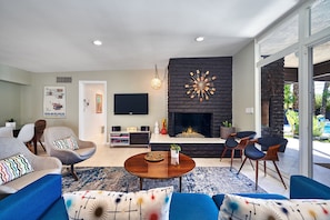 Smart TV, fireplace, DVD player, books