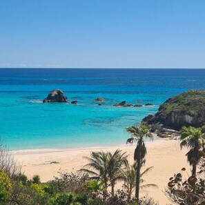 On the beach, sun-loungers, beach towels