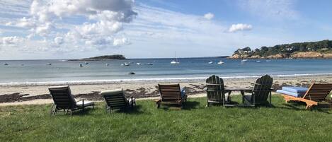 On the beach, sun-loungers, beach towels