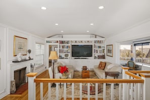 Smart TV, fireplace, DVD player, books