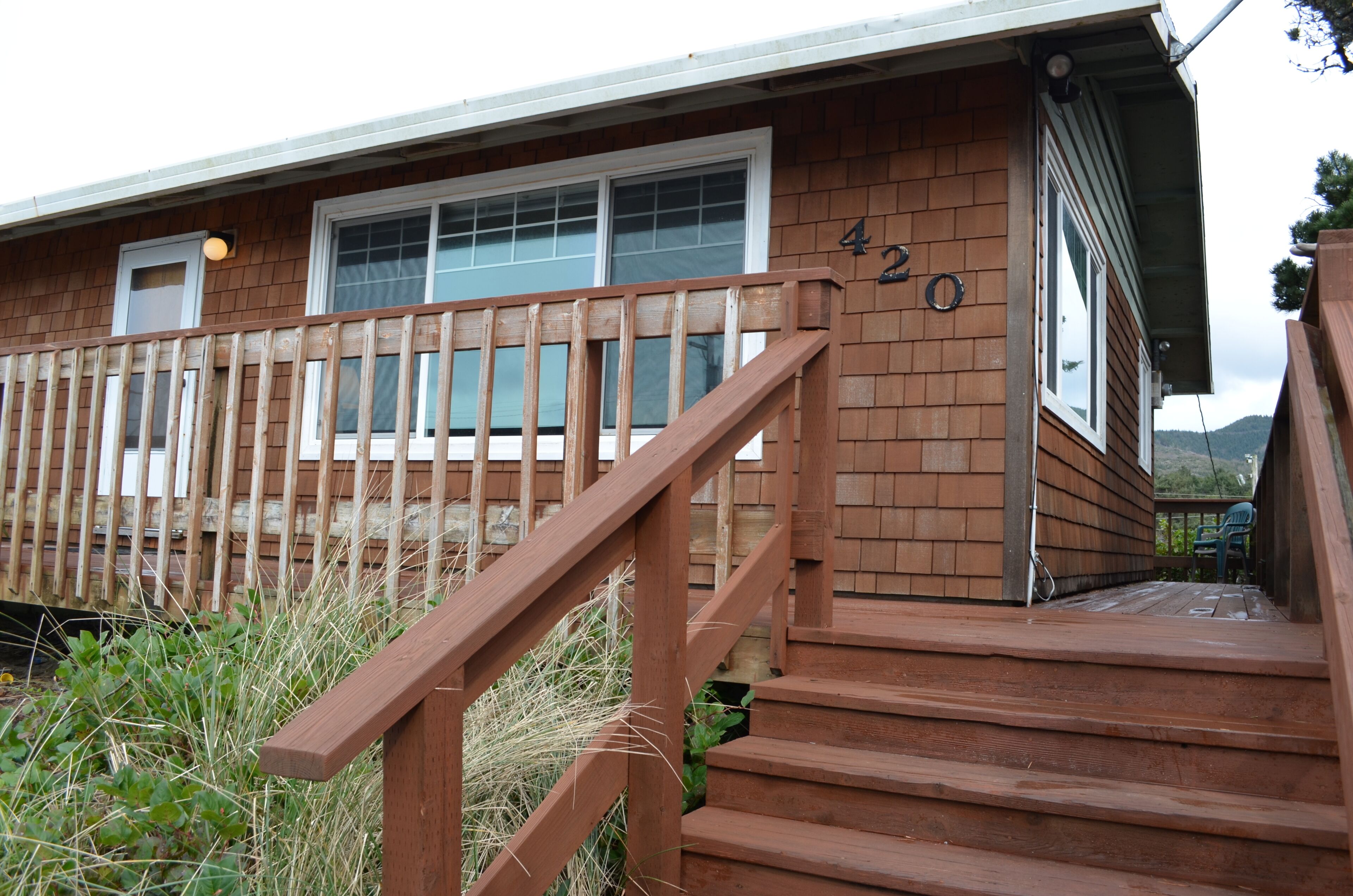 Steps to the beach from this cozy, updated home w/ an oceanview, WiFi, fireplace