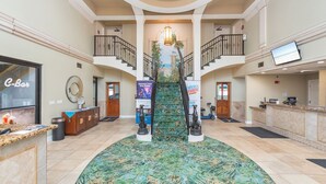 A spacious lobby with a central staircase, a reception desk, and a C-Bar. - Spectacular VIP Corner Oceanfront @ Anderson Ocean, Wrap-Around Balcony 2B/2Ba (Myrtle Beach)