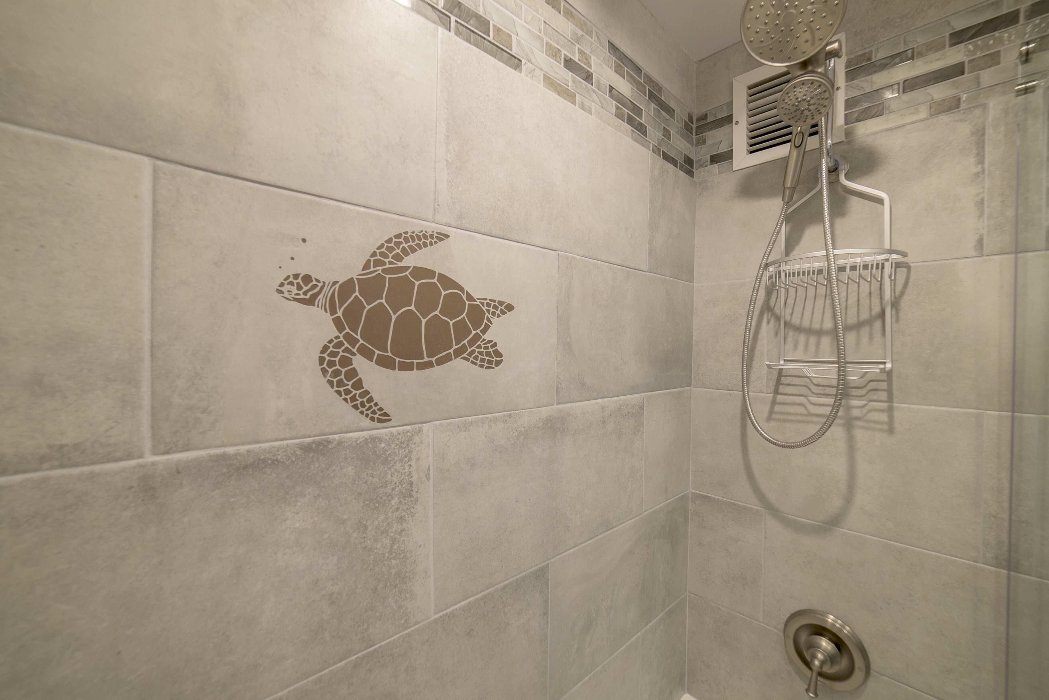 Combined shower/tub, hair dryer, towels, toilet paper