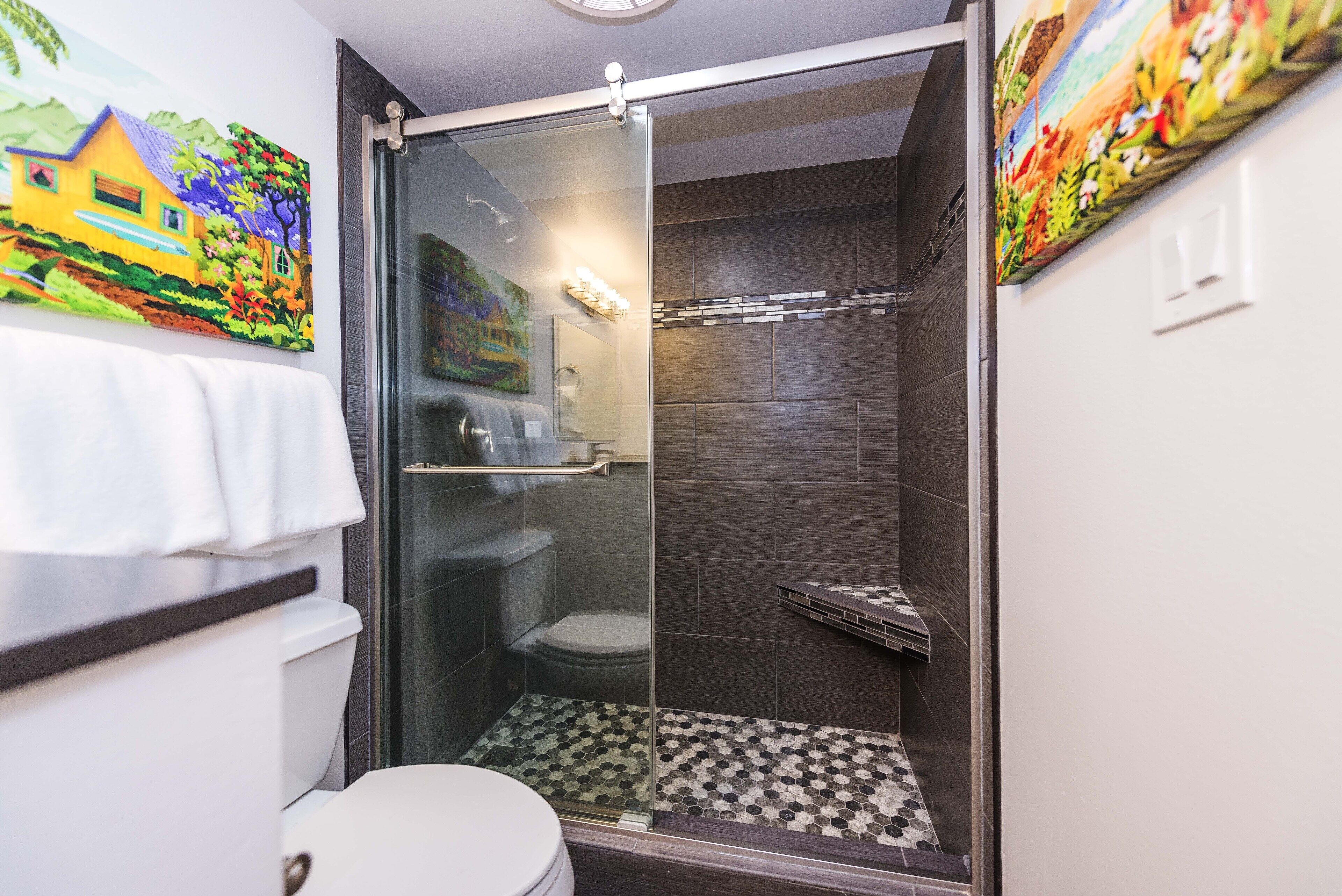 Shower, hair dryer, towels, shampoo