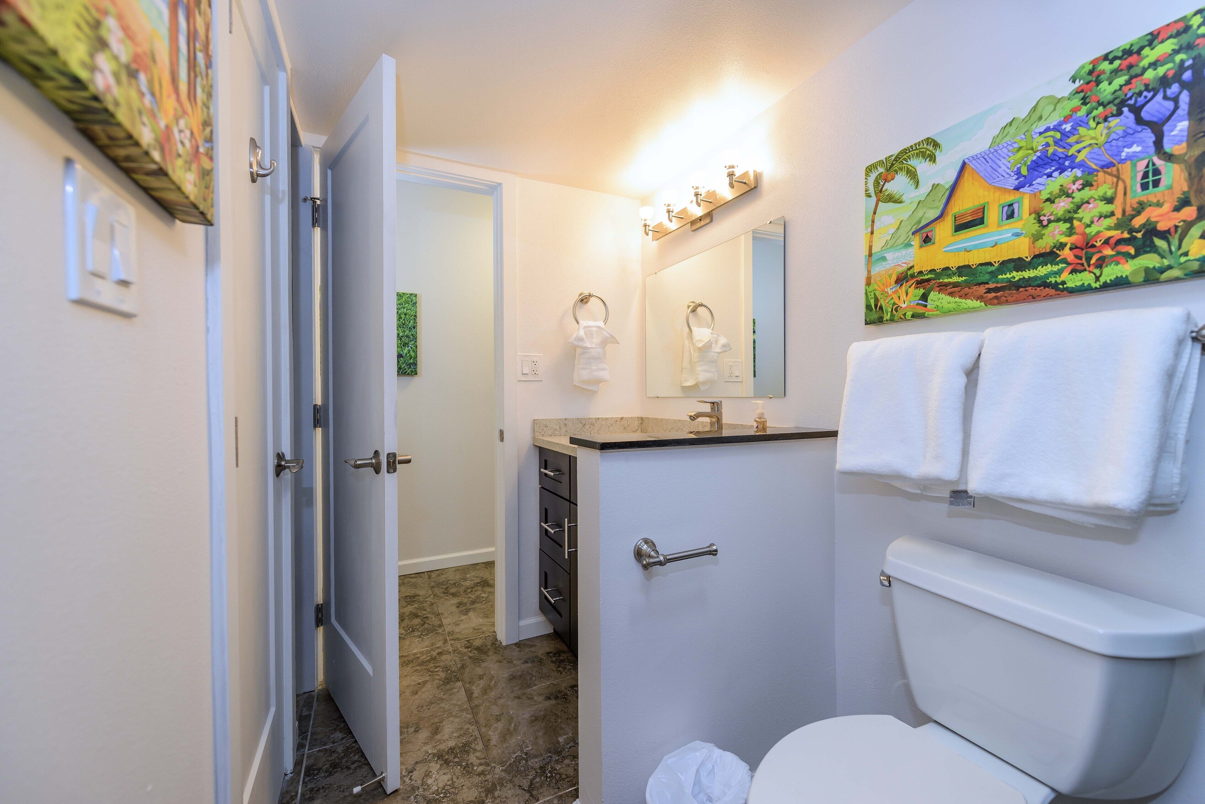 Shower, hair dryer, towels, shampoo