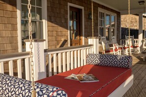 hanging bed on the front porch