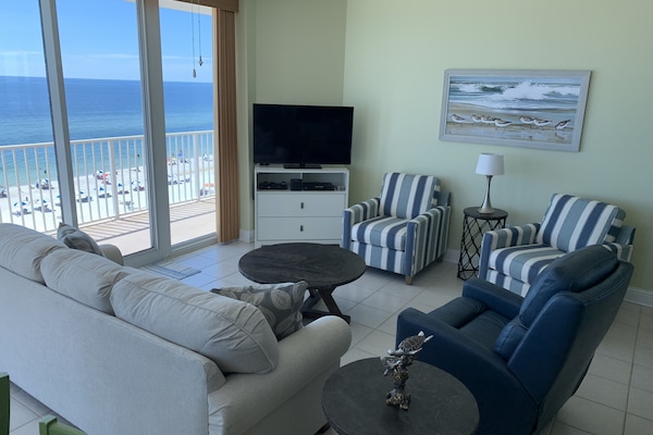 LR features HDTV and Blu-Ray, 2 chairs, a sofa, and swival rocker/recliner.