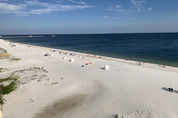 85 Foot Wrap Around Balcony Offers Endless Views of Sugar White Beach And Gulf.