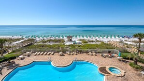 A pool area with a view of the beach and ocean. - Beachfront Condo!Beautiful View, On the Beach! Unit 308 (Destin)