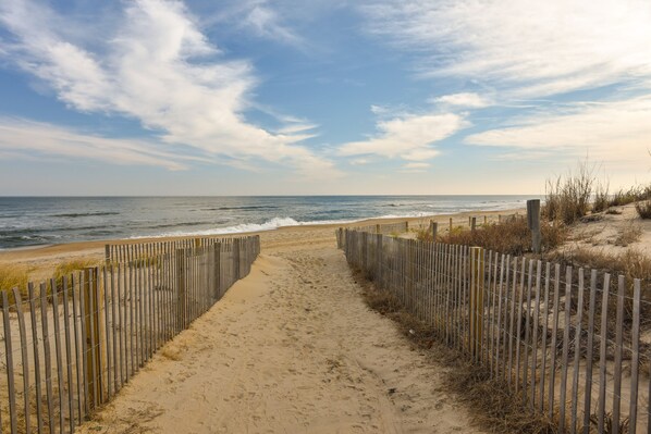 On the beach, sun-loungers