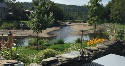 In town, river across the street, families welcome