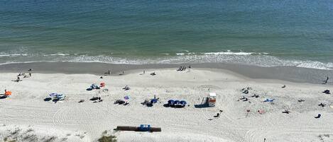 On the beach, sun loungers