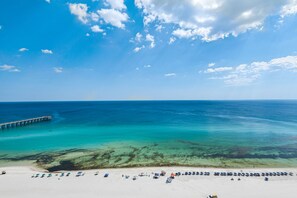On the beach, sun-loungers