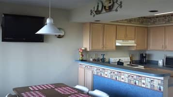 Coffee/tea maker, fridge, microwave, oven