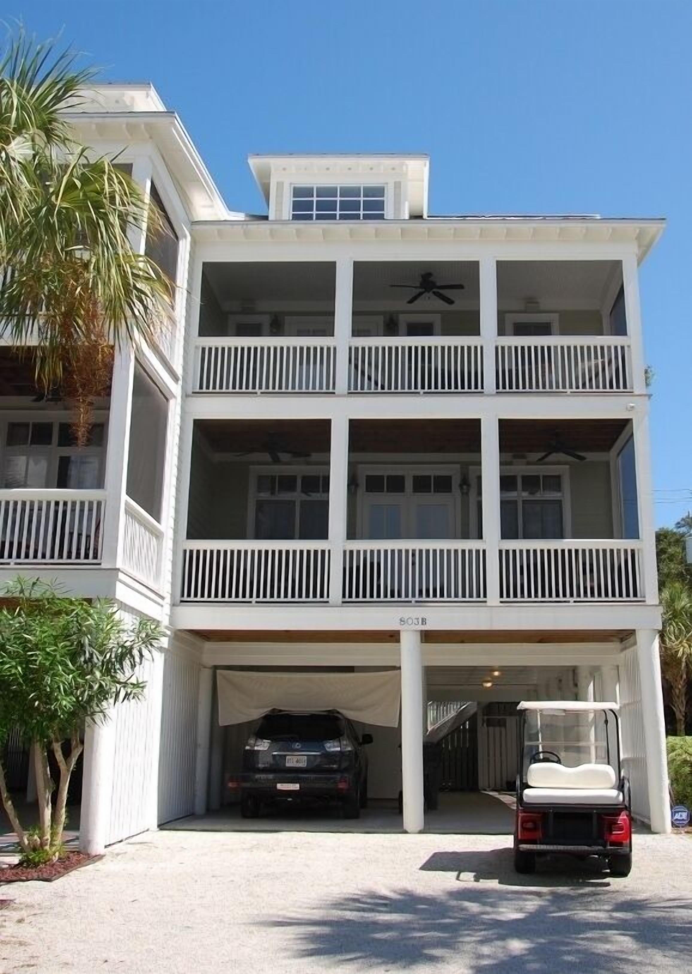 Rear screened porches.
Golf carts are available for rent from Island Outfitters.