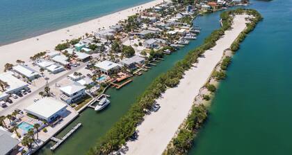One Bedroom remodeled stand-alone Unit - steps from our private beach.