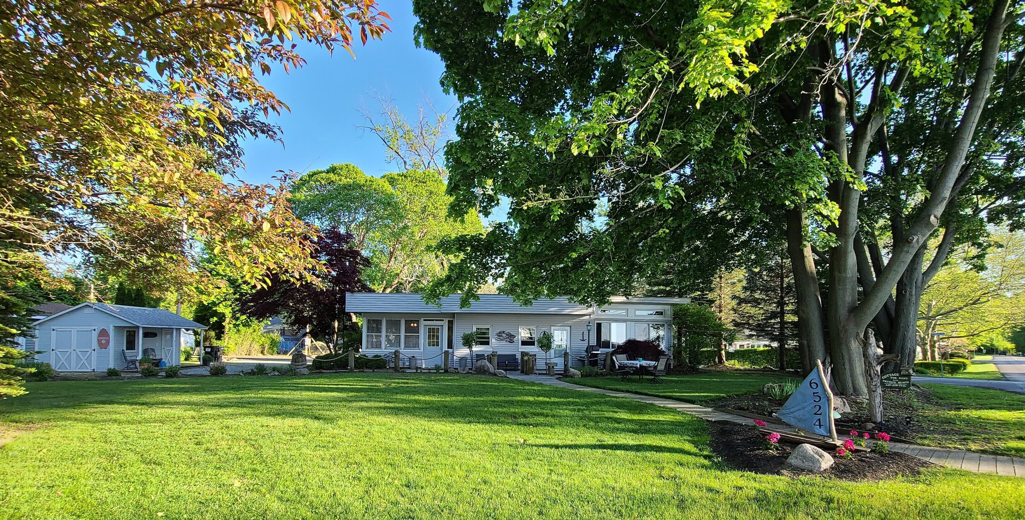 Lake View Home & Private Beach across the road exclusively for Skiff Cottage.
