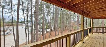 Log Cabin with large deck and dock in best location on the Lake!