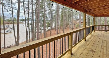 Log Cabin with large deck and dock in best location on the Lake!