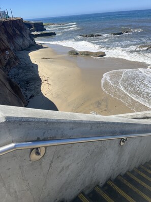 On the beach, sun-loungers, beach towels