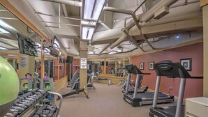 A gym with treadmills, dumbbells, and exercise equipment. - SM8175, Heart of River Run Village! (Keystone)
