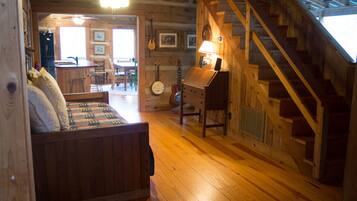 Älytelevisio, takka, DVD-soitin, kirjoja