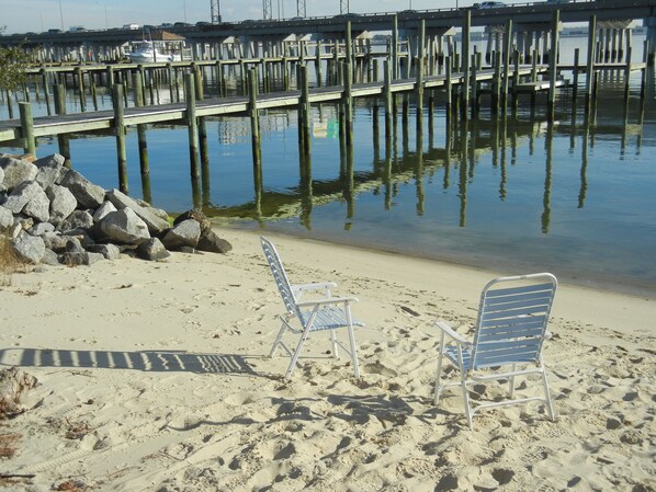 On the beach, sun-loungers