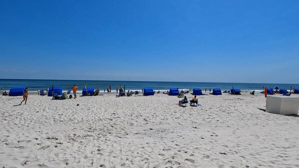 On the beach, sun loungers, beach towels