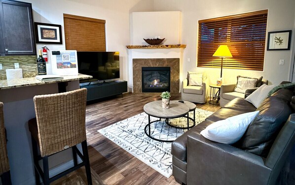 Smart TV, fireplace, smart speakers