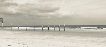 Beachfront 4-bedroom condo, steps from Daytona Beach.