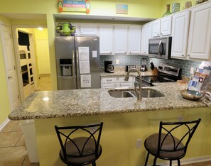 Fridge, microwave, oven, stovetop - Direct Beach Front!  Tropic Isles 604........ (Gulf Shores)