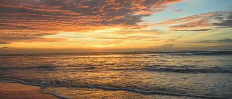 On the beach, sun-loungers, beach towels