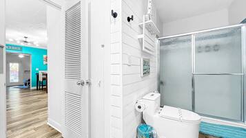Shower, hair dryer, towels, soap