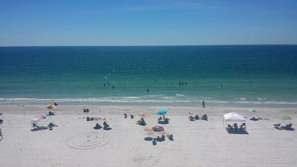 On the beach, sun loungers, beach towels