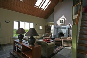 Fireplace, books, stereo