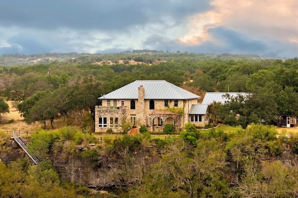 Stone home cliff side
