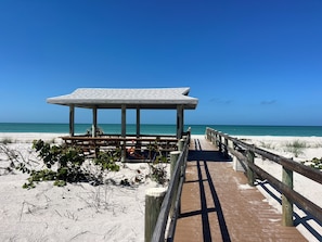 On the beach, sun loungers, beach towels