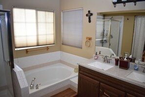 Combined shower/bathtub, hair dryer, towels, soap