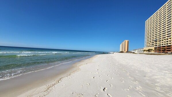 On the beach, sun-loungers, beach towels