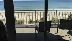 A balcony with a view of the beach and ocean. - Luxurious and Elegant, 4BR Ocean Front, Get away! Ocean Blue - Myrtle Beach, SC! (Myrtle Beach)