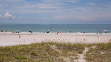 On the beach, sun loungers, beach towels