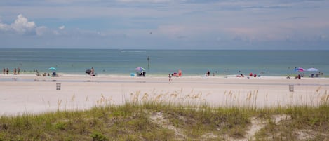 On the beach, sun-loungers, beach towels