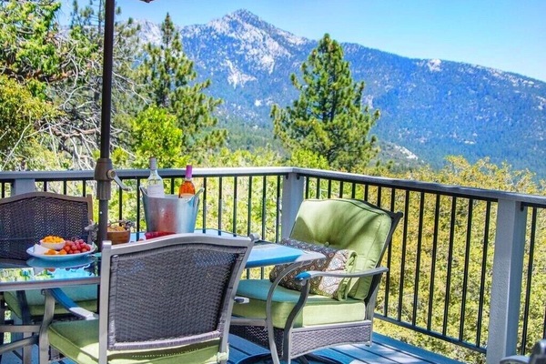 “Unwind outdoors: comfy seating, crisp mountain air, and panoramic views.”