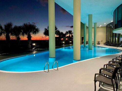 TOP FLOOR with PENTHOUSE views! BEACHFRONT- 2 BDRM-2 BATH, 2 POOLS and HOT TUB!