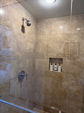 Bathtub, hair dryer, towels, soap