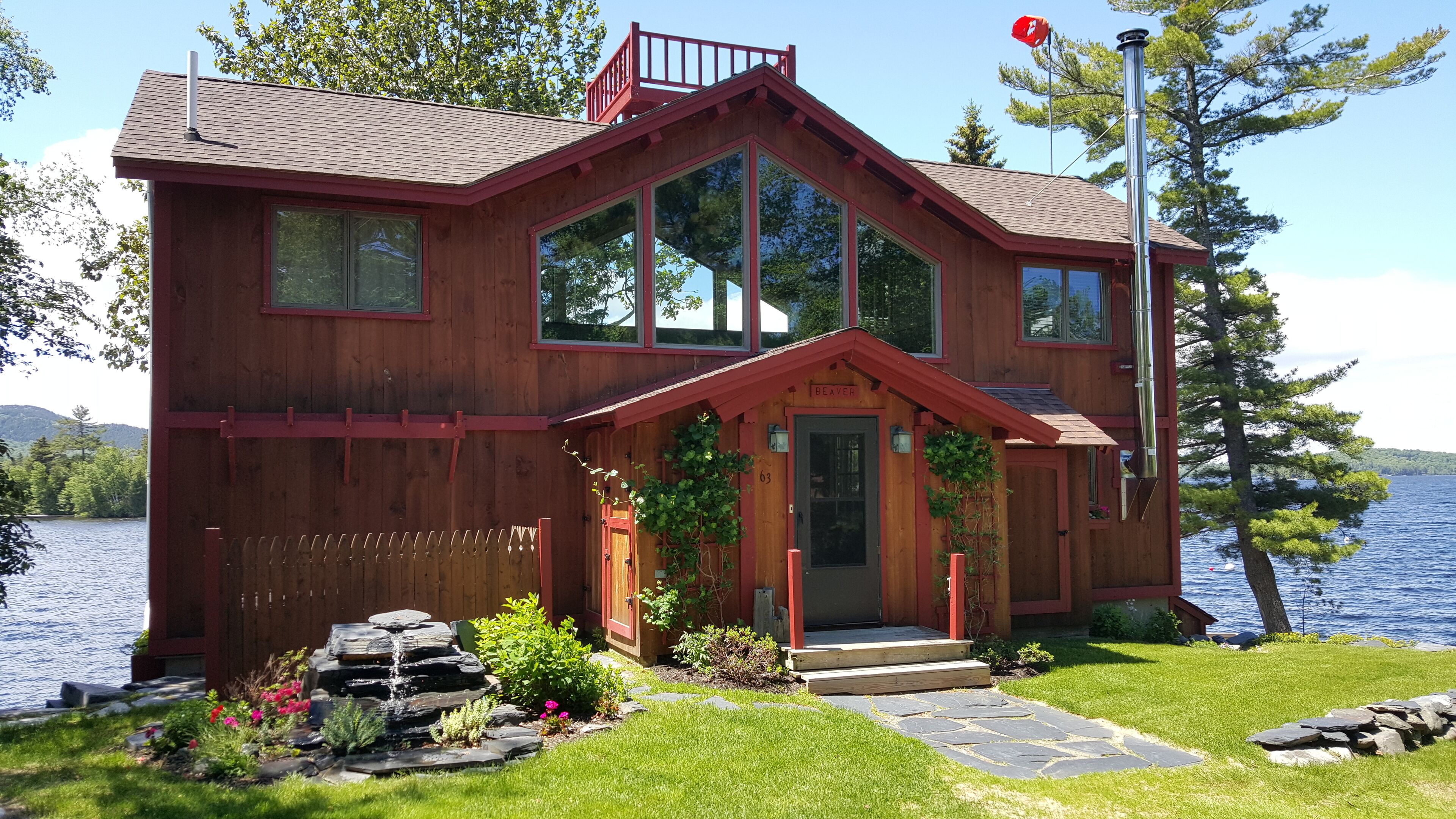 Cozy Lakeside Home offers unbeatable location feet from Moosehead Lake
